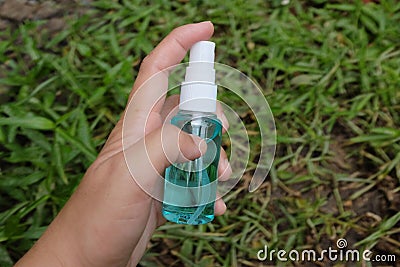 Spray alcohol female hands hand sanitizer gel to patient eliminate germs covid 19 prevention concept Stock Photo